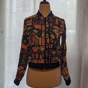 neon patterned shape adidas jacket